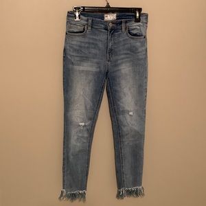 Free people skinny blue jeans with fringe